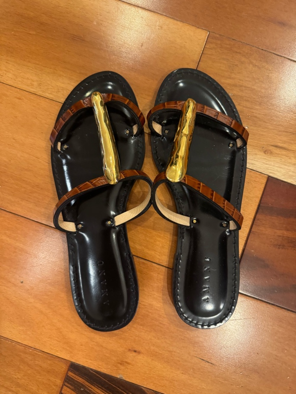 Amanu Sahara Black Sandals with Gold Accent and Tortoiseshell Strap